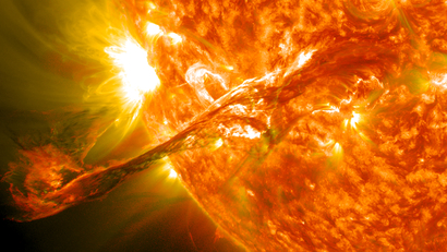 A solar flare: a corona, a long filament of solar material, erupting out from the sun into space.