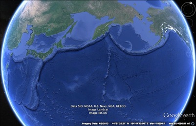 Edge of the pacific plate along Asia and North America. The edge of the plate is visible as a deep oceanic trench. The Mariana trench is found along this boundary.