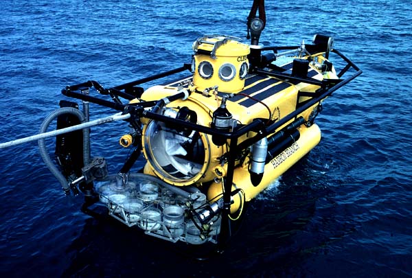 a yellow Submersible with lights on it