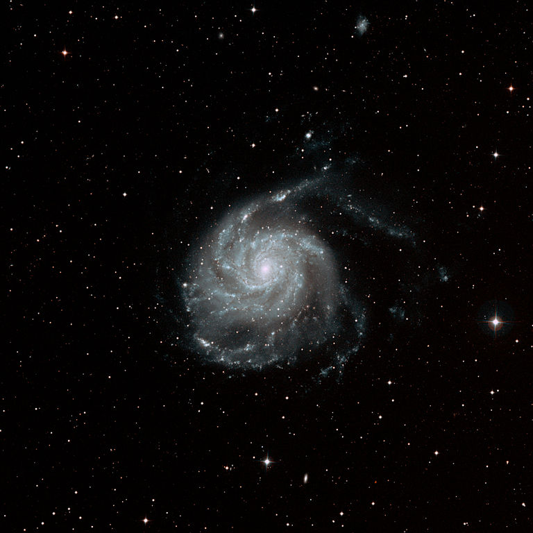a face-on spiral galaxy about 27 million light-years away in the constellation Ursa Major
