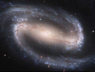 A standard spiral galaxy. There appear to be two arms of the spiral