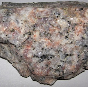 speckled rock with colors of pink, black, and white