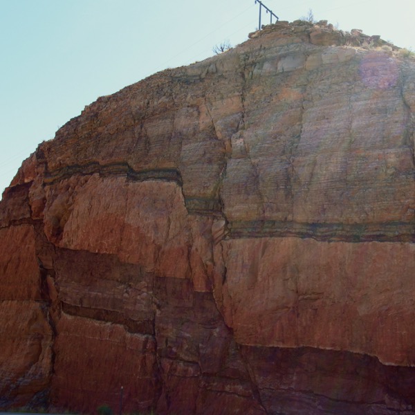 A rock formation showing layers of rock offset from each other indicating faults
