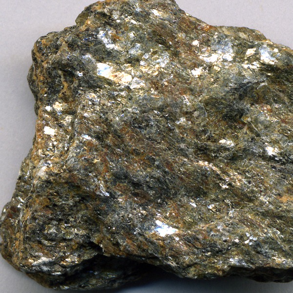 a light colored rock with shiny flecks embedded