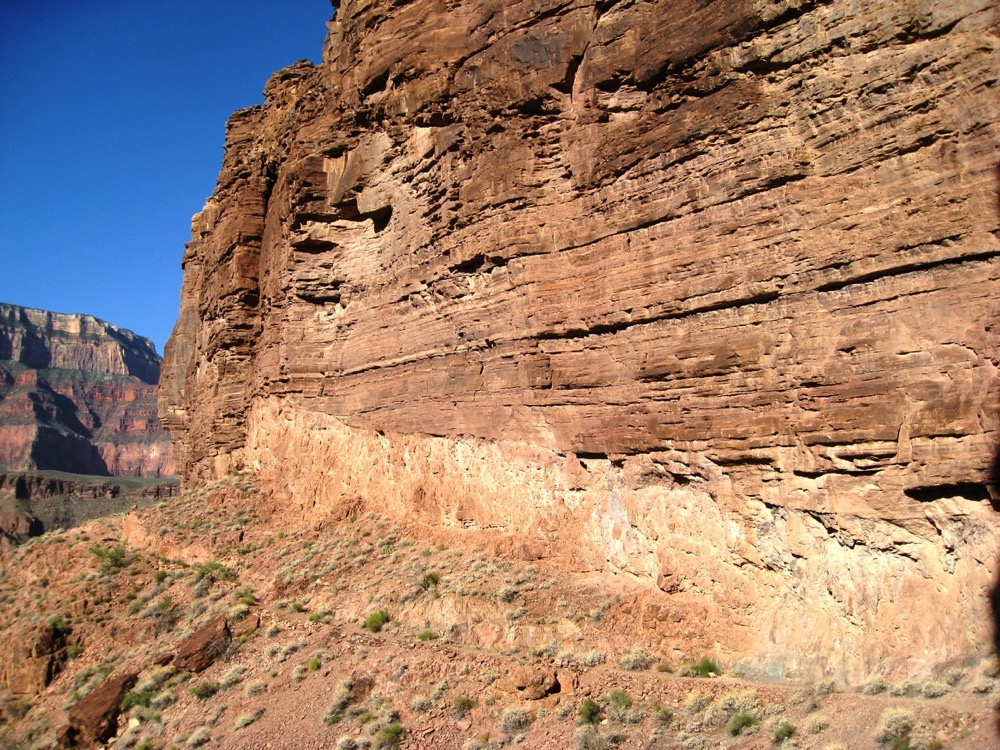 layers of rock forming a canyon wall