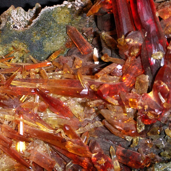 red-orange crystals in a mineral specimen