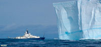 Iceberg and a NOAA ship near Antarctica