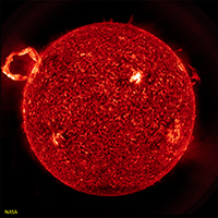 A large solar prominence erupting on the Sun's surface