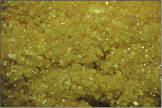 Figure 3.2, yellow sulfur crystals.