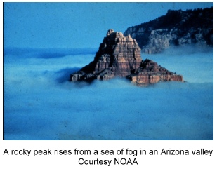 Peak surrounded by fog