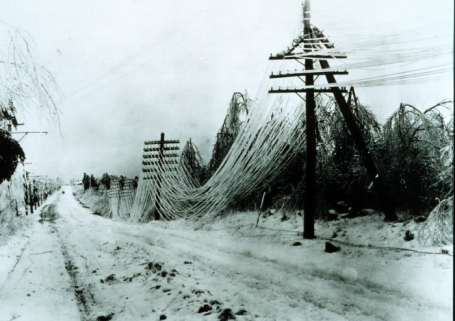 Heavy ice downs power lines (historical photograph)