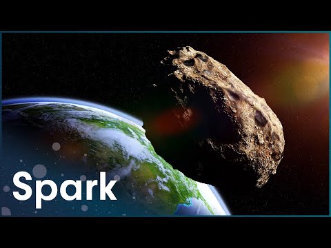 Thumbnail for the embedded element "Are We In Danger Of An Asteroid Attack? | Cosmic Travellers | Spark"