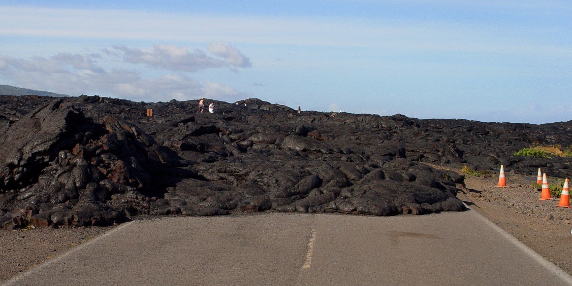 Extrusive igneous rock. Basalt lava flow on Old Chain of Craters Road, Hawaii. With permission by: Garry Hayes and Susan Hayes from http://geotripperimages.com/Volcanism/lava_flows.html