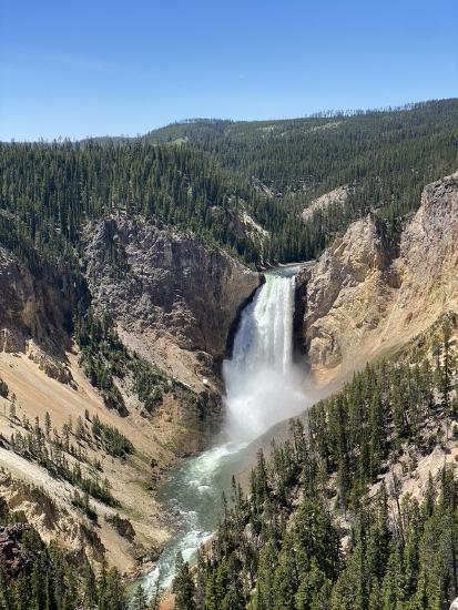 The waterfall is in a valley