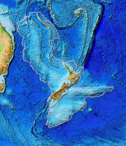 Surface map of the Earth showing New Zealand with an outline of its continent in the ocean.