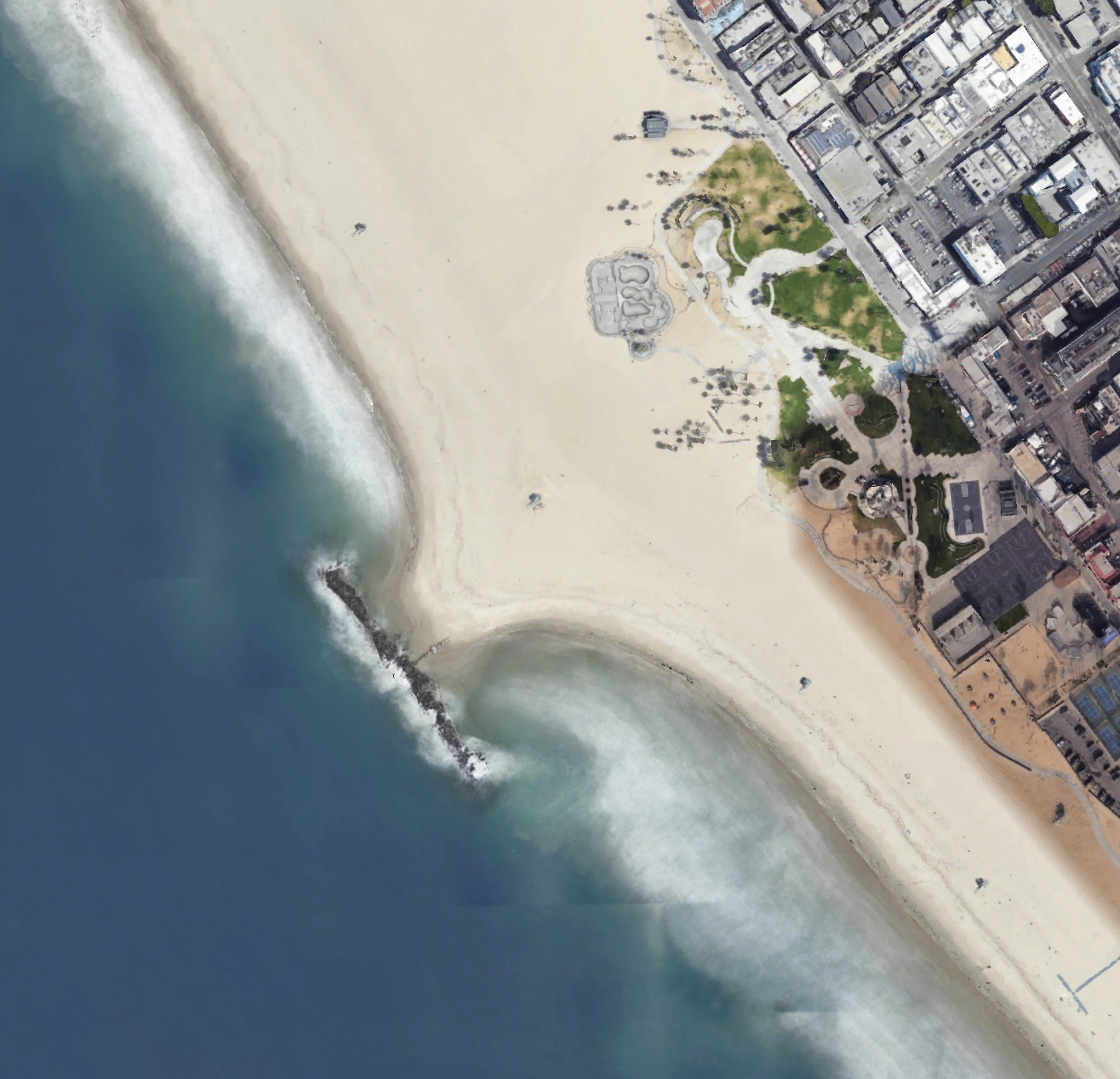 A tombolo formed behind the breakwater at Venice, CA