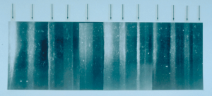 Image of ice core showing seasonal color changes like a tree rings.