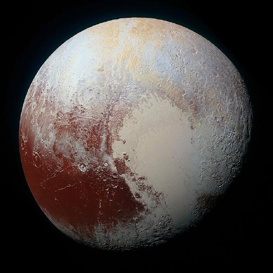 Image the surface of Pluto. In this photograph from New Horizons, the smooth, white Sputnik plains are seen covering most of the upper right of the image. Rugged, heavily cratered terrain covers the lower center and upper left.