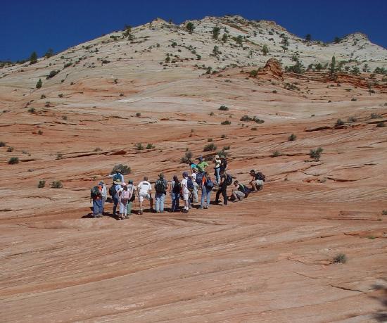 The students are on the red rock