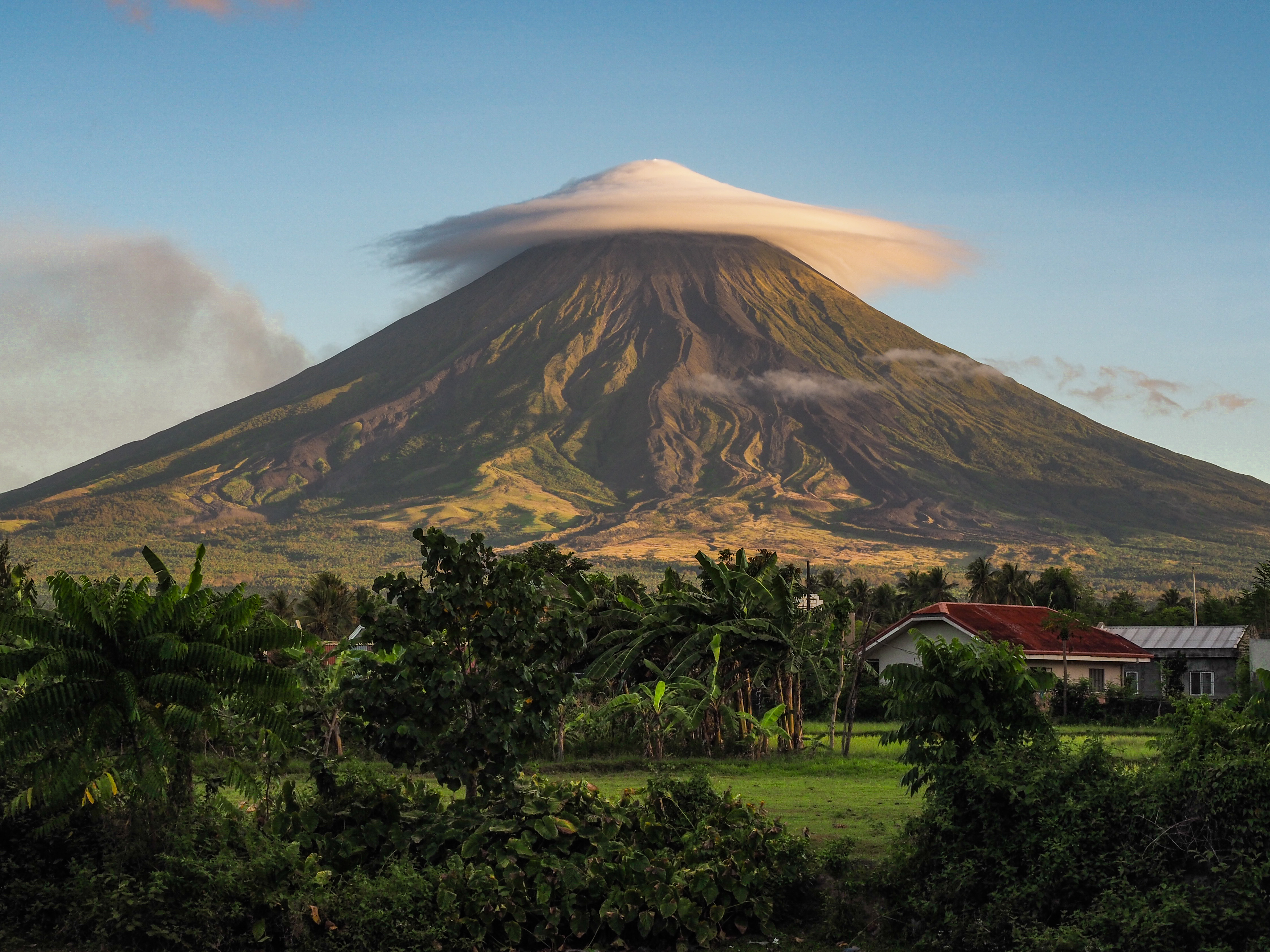 Hat like cloud covering a mountain top.