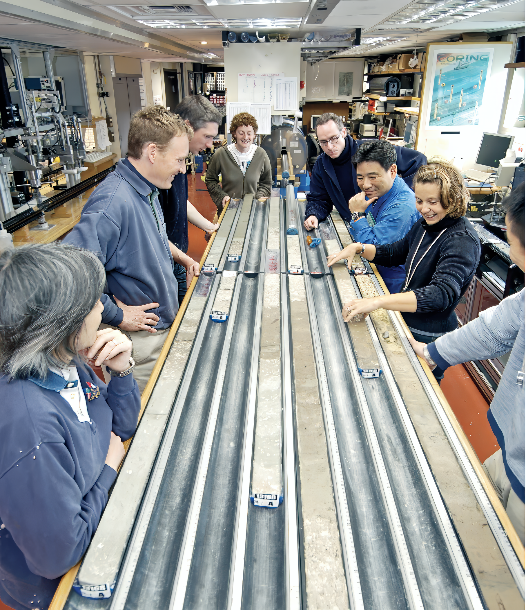 Scientists looking at sediment cores