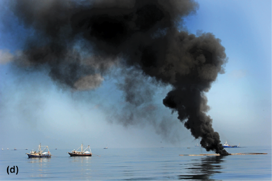 Dark black smoke from a submerged fire