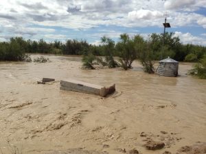 Source: USGS image in the Public Domain Formerly dry wash now a violent torrent after heavy rain in the area