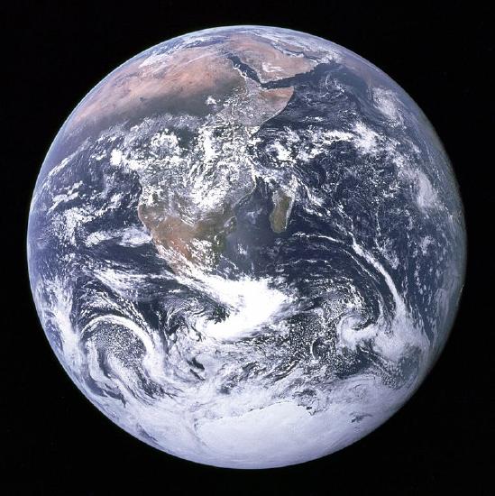Photograph of Earth, with a view of Africa and clouds.