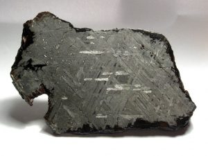 The meteorite is polished showing the Widmanstätten Pattern.