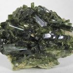 Dark green crystals of diopside, a member of the pyroxene family