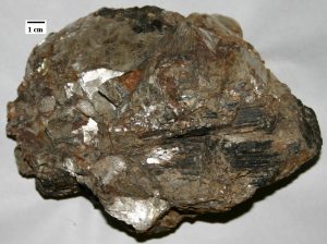 Pegmatic texture with large grains of minerals, mostly of felsic composition