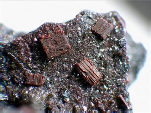 Figure 2.6.6 C. Fayalite (Fe-rich olivine) crystals from Eifel, Germany.