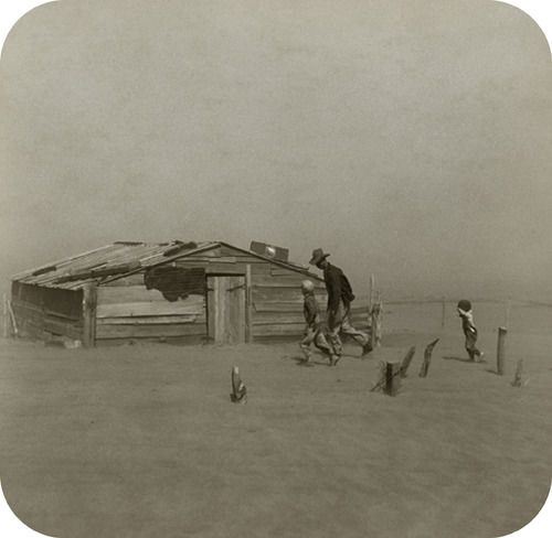 A farmer in a dust storm during the Dust Bowl